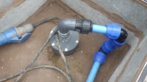 Close up photo of a borehole with a new cap