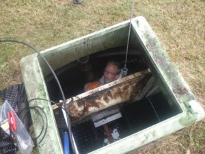 Image of a service engineer inside a sewage treatment plant