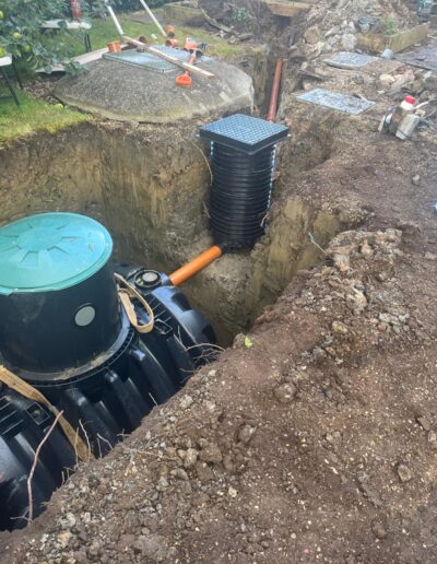A domestic 7-person Graf package sewage treatment plant in the ground during installation